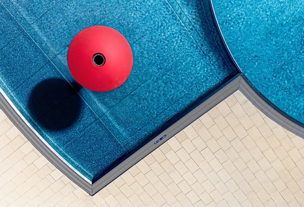 Red Ball Blue Pool by Stephan Rückert — canvas wall art