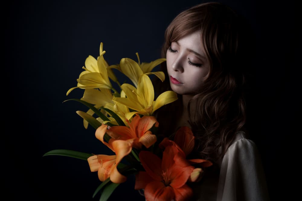 Pensive Woman with Lilies by Hiroaki Suemasa — canvas wall art