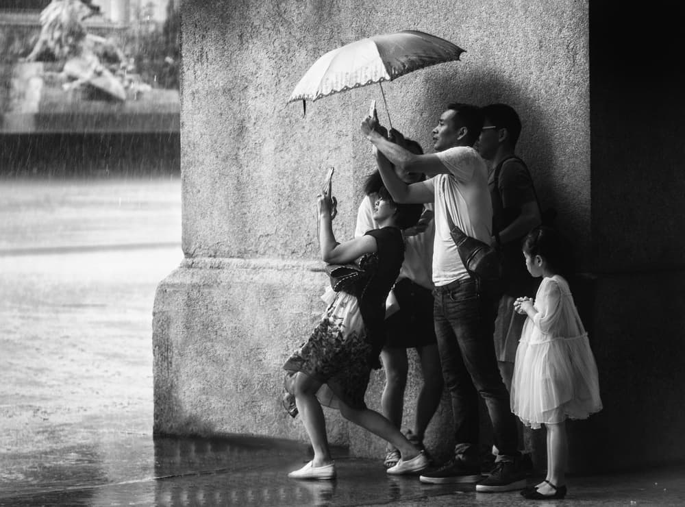 Sheltering From City Rain by Pristine Clothes — canvas wall art