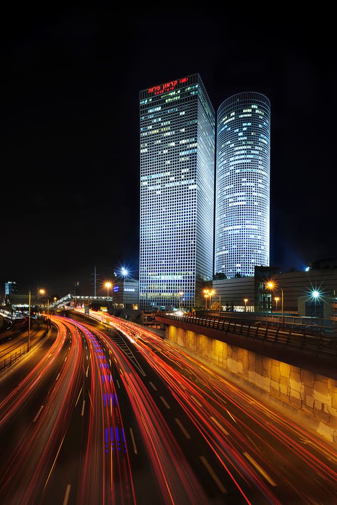 Modern City Nightscape by Eyal Amer — canvas wall art