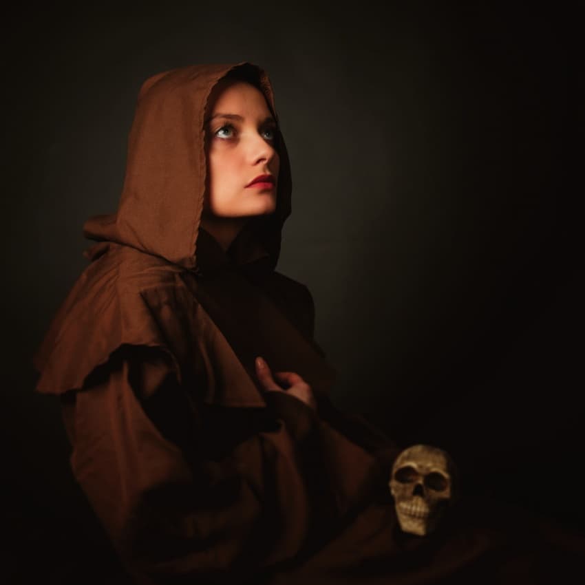 Woman Contemplating Skull by Alexandra Fira — canvas wall art