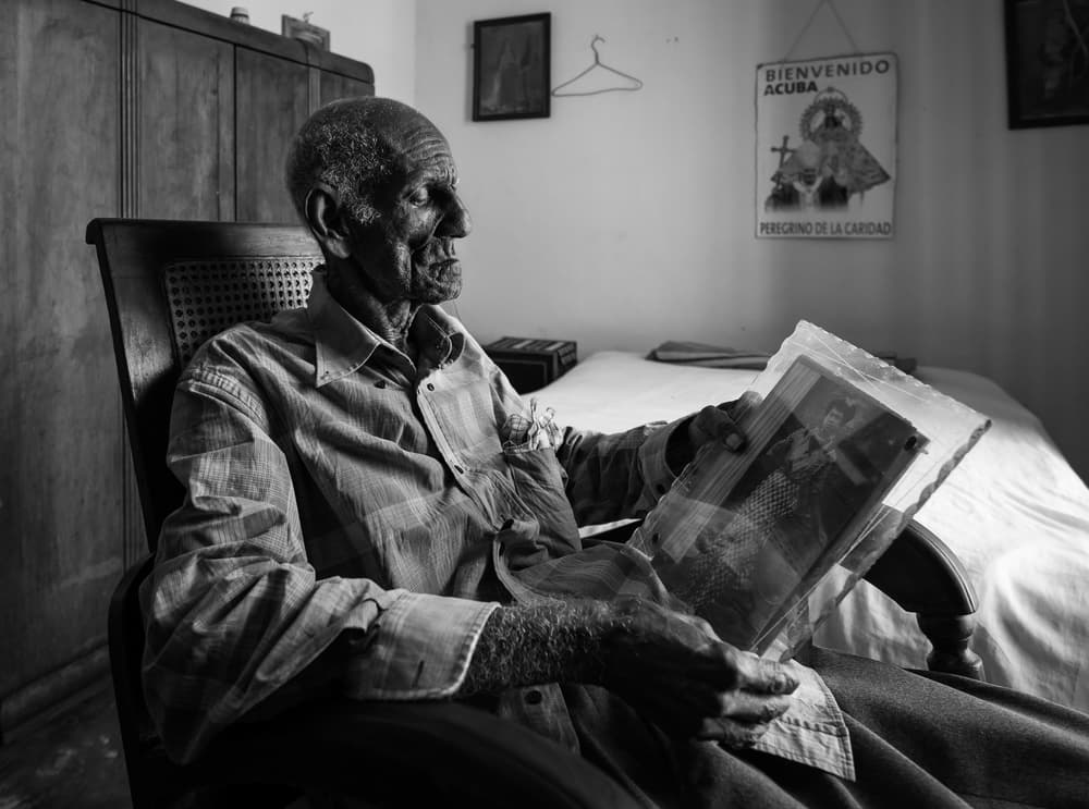 Elderly Man Reflects by Melih Karakaya — canvas wall art