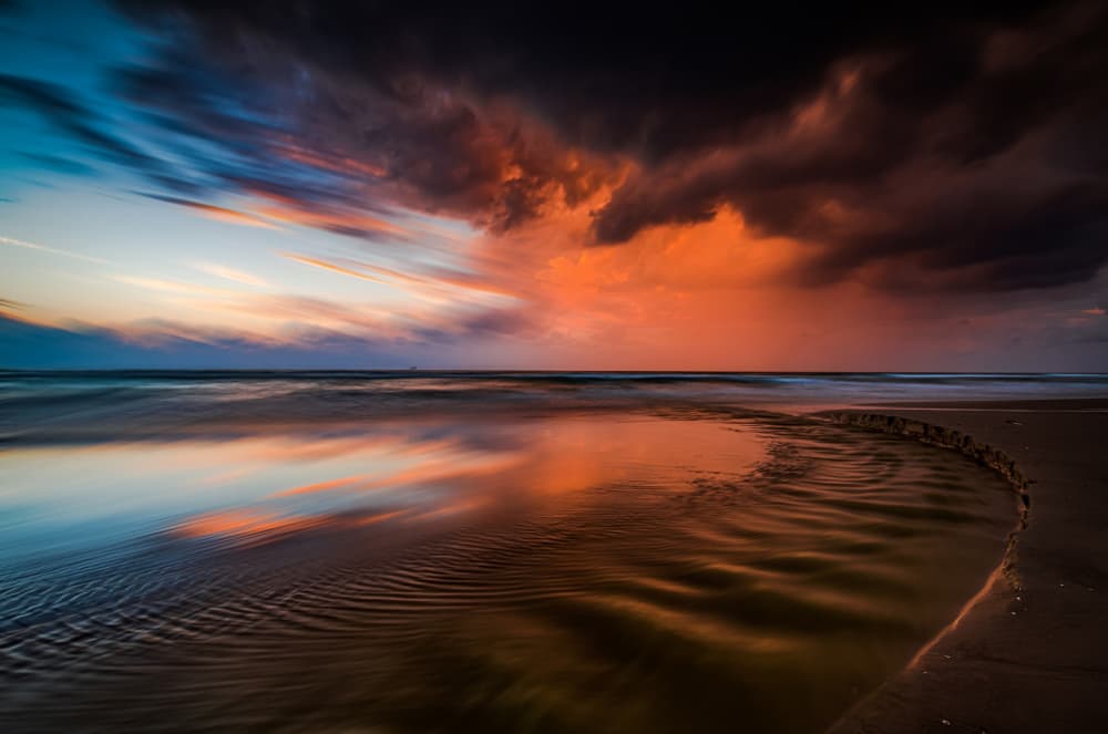 Coastal Sunset Reflection by Isam Telhami — canvas wall art