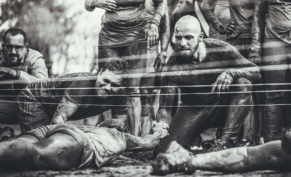 Mud Race Teamwork by Carlos Gonzalez — canvas wall art