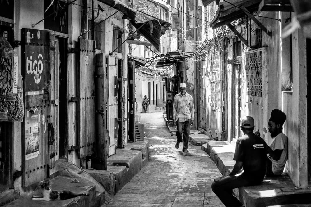 Old City Alley Life by Michel Groleau — canvas wall art