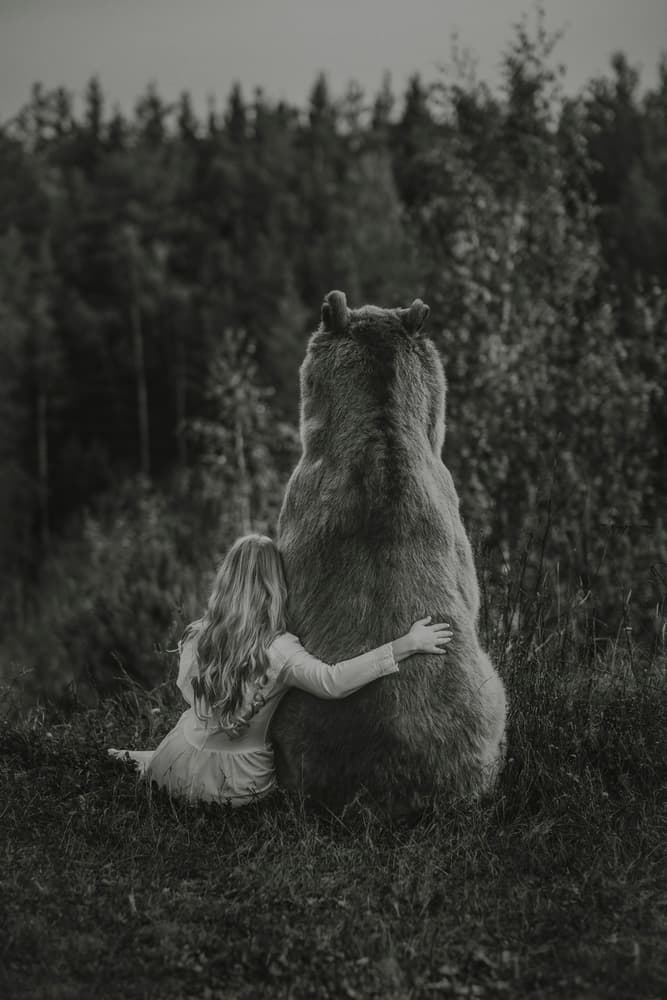 Girl And Bear Embrace by Olga Barantseva — canvas wall art