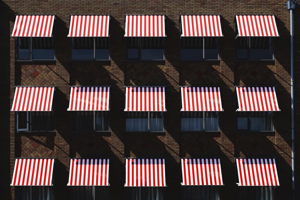 Striped Awnings Shadow Play by Hans-Wolfgang Hawerkamp — canvas wall art