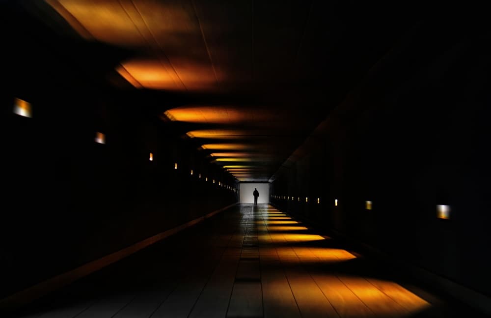 Lone Figure Dark Tunnel by Samanta Krivec — canvas wall art