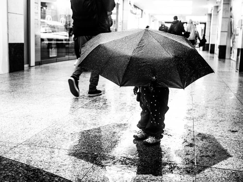 Small Child Big Umbrella by Adam Street Photographer — canvas wall art
