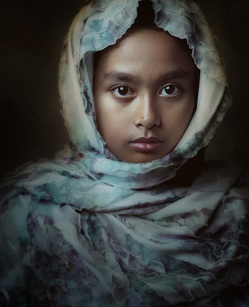 Thoughtful Girl In Scarf by Hari Sulistiawan — canvas wall art
