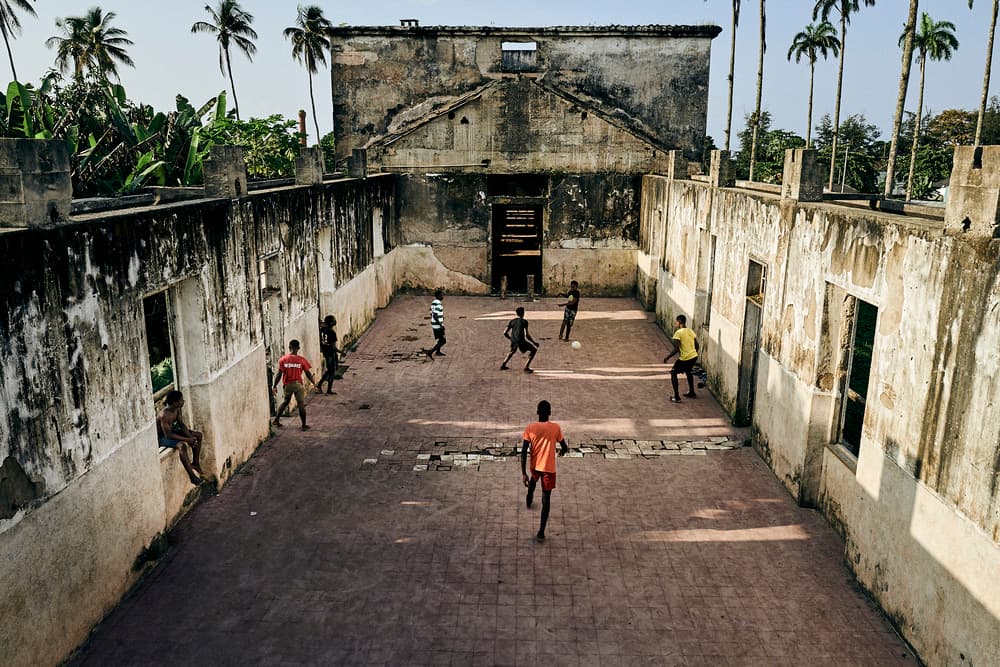 Courtyard Soccer Game by Luís Godinho — canvas wall art