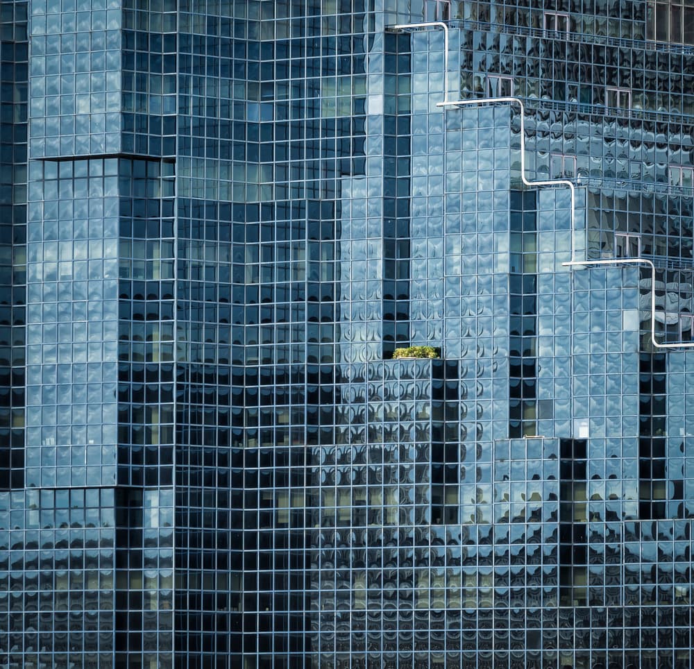 Reflective Glass Facade by Peter Pfeiffer — canvas wall art