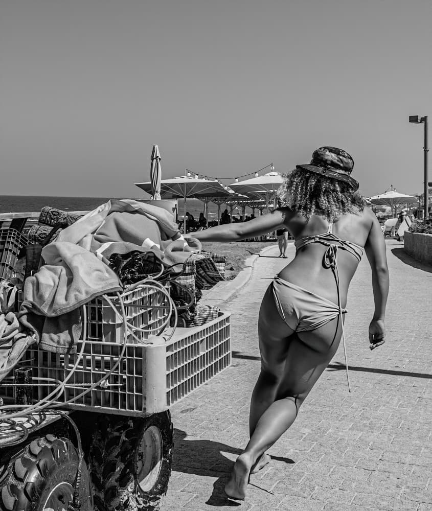 Woman Pulling Beach Cart by zyfeller — canvas wall art