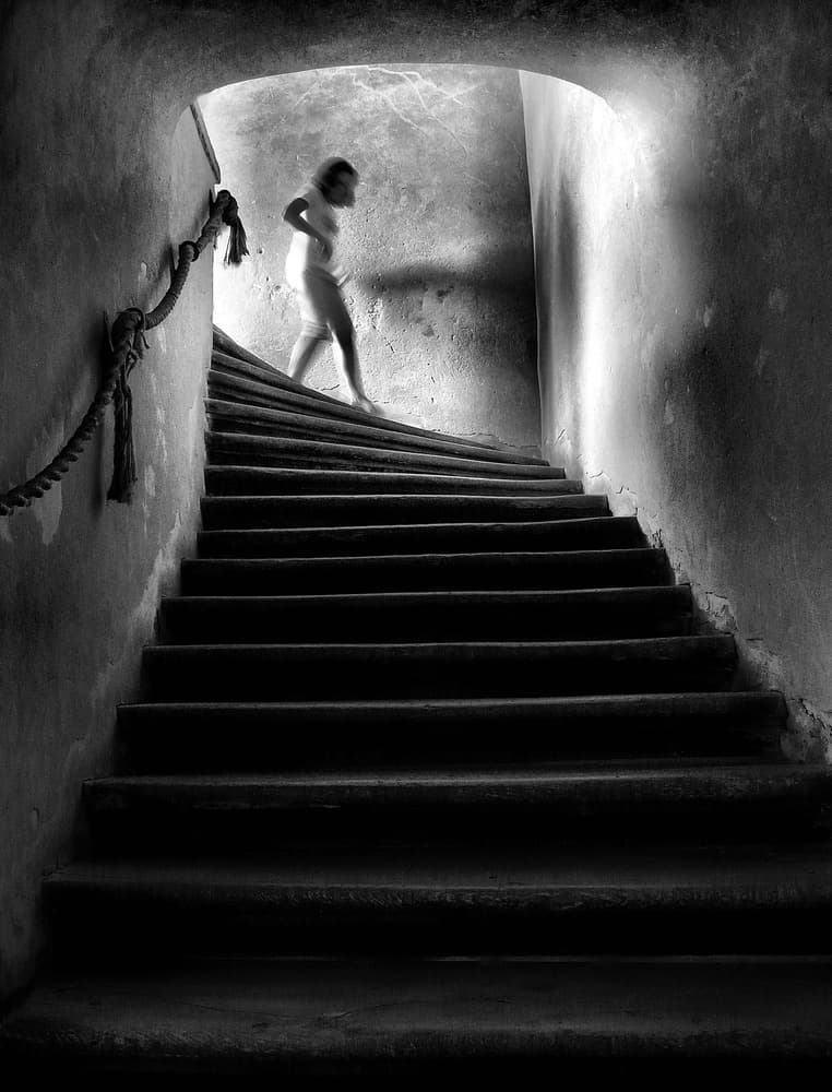 Mysterious Figure Dark Stairs by Wojciech Pokora — canvas wall art