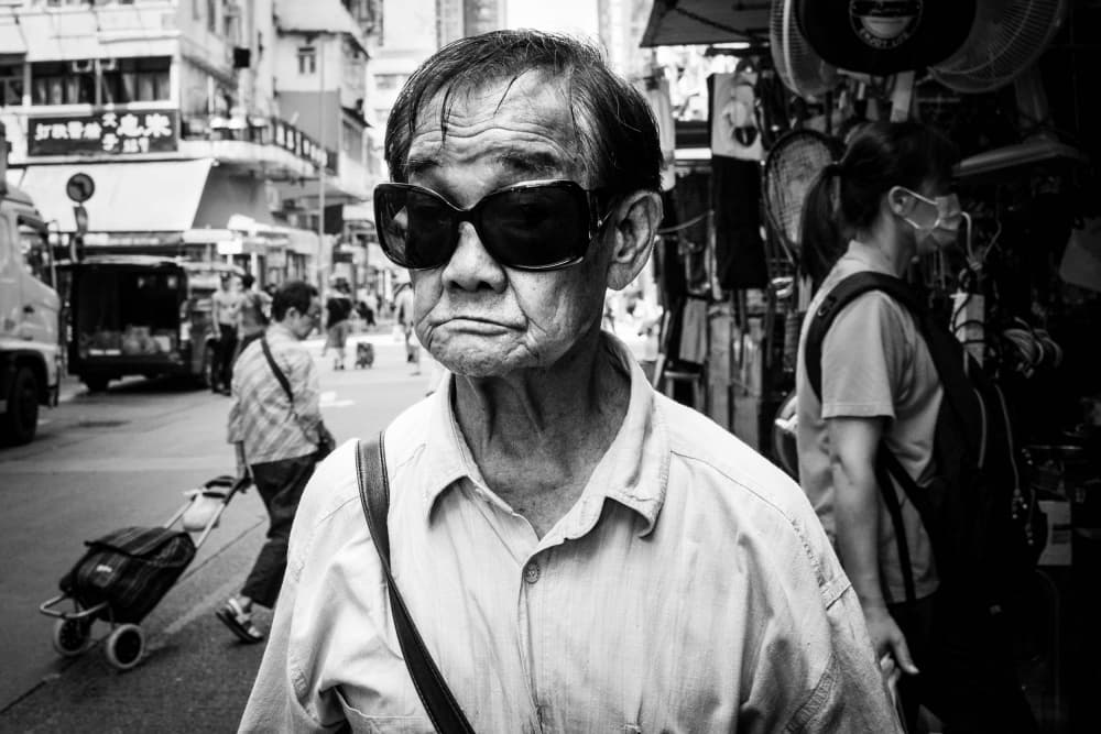 Elderly Man in Sunglasses by Craig Meakin — canvas wall art