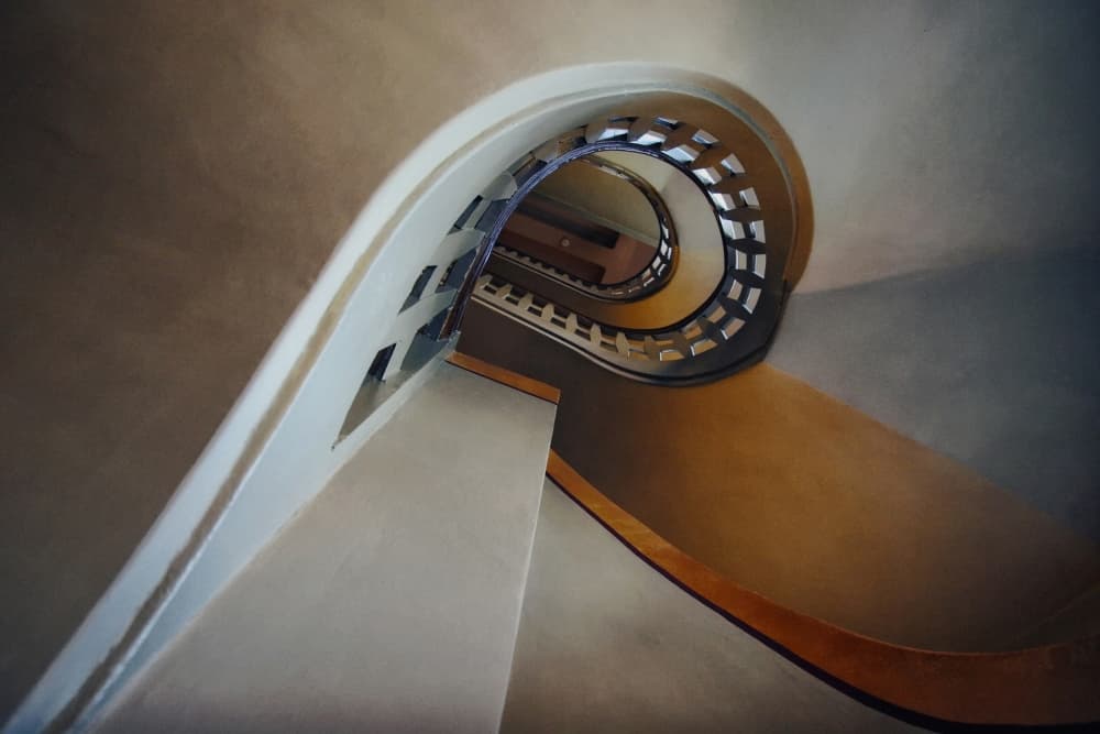 Elegant Spiral Staircase by Holger Droste — canvas wall art