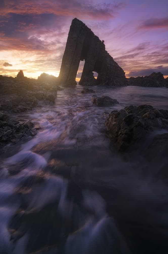 Dramatic Sea Arch Sunset by Jorge Lopez Noval — canvas wall art