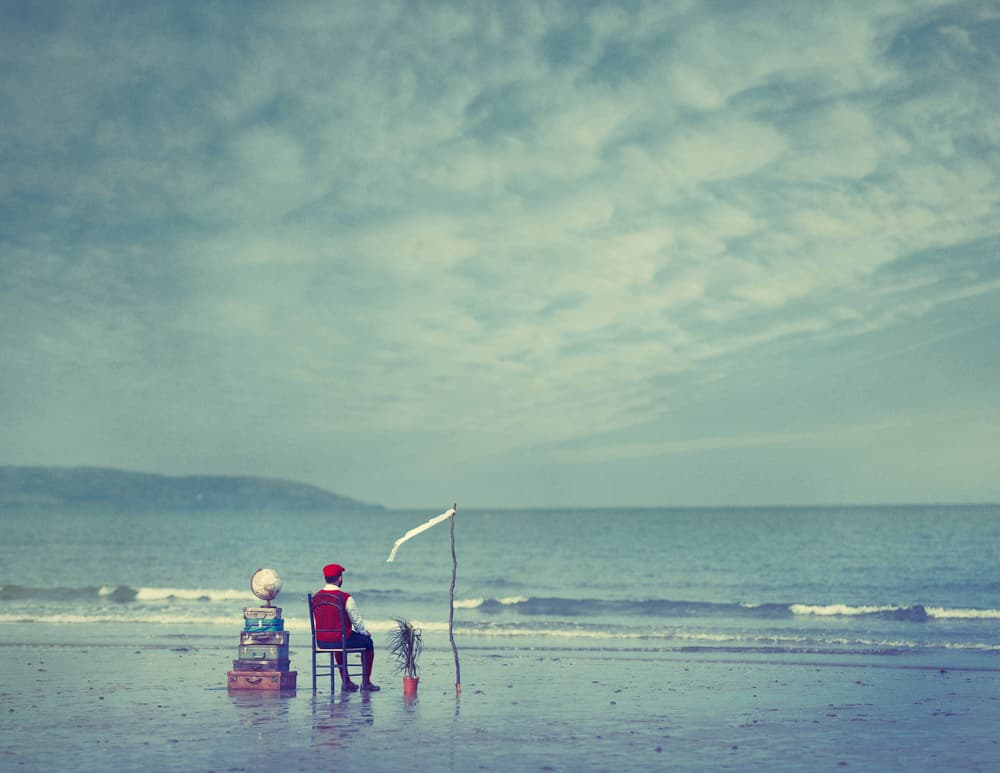 Solitary Beach Traveler by Magdalena Russocka — canvas wall art