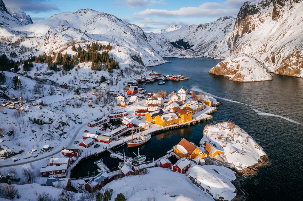 Colorful Snowy Fjord Village by Adrian Popan — canvas wall art