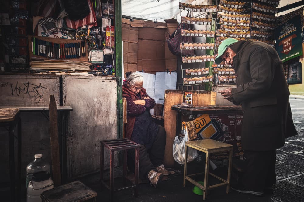 Old Woman's Market Stall by Marco Tagliarino — canvas wall art