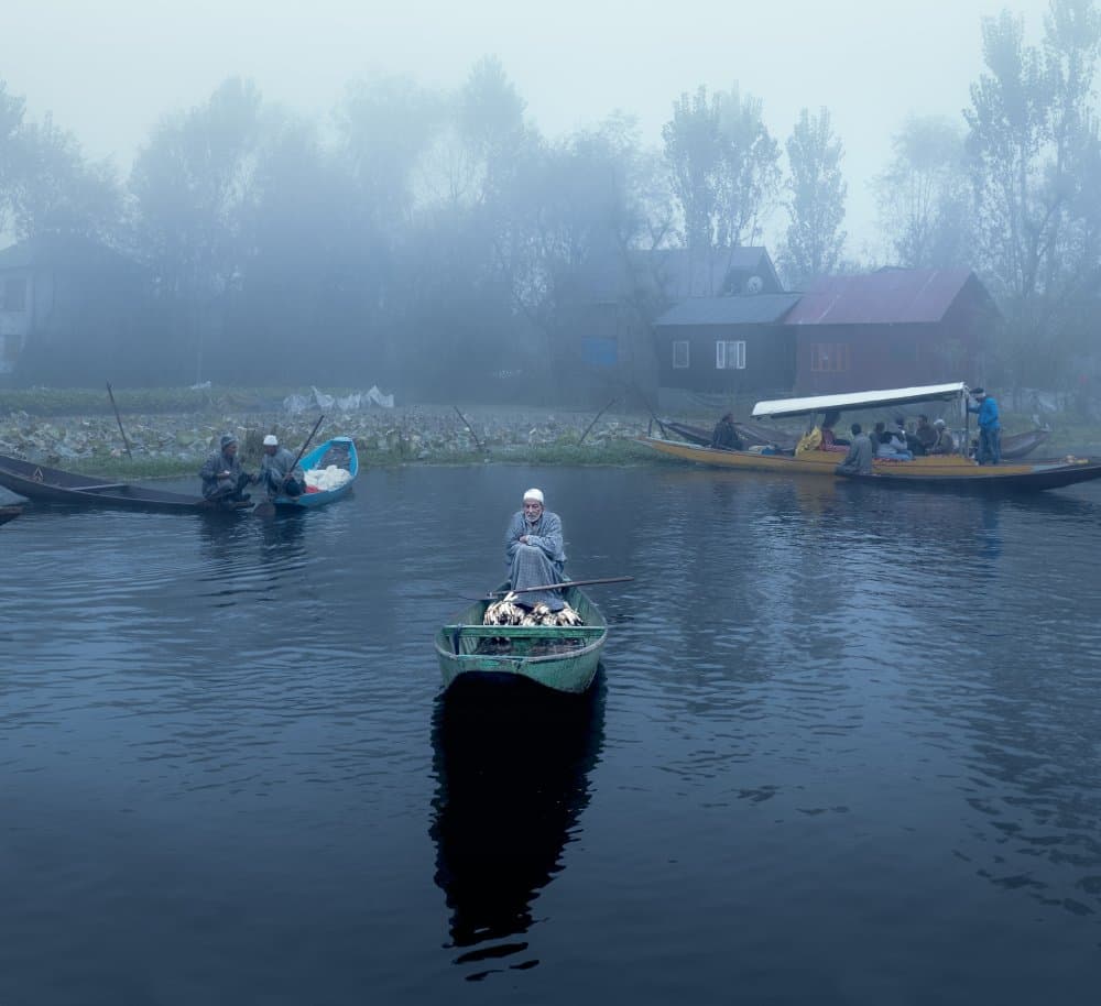 Man on Misty Lake by Jassi Oberai — canvas wall art