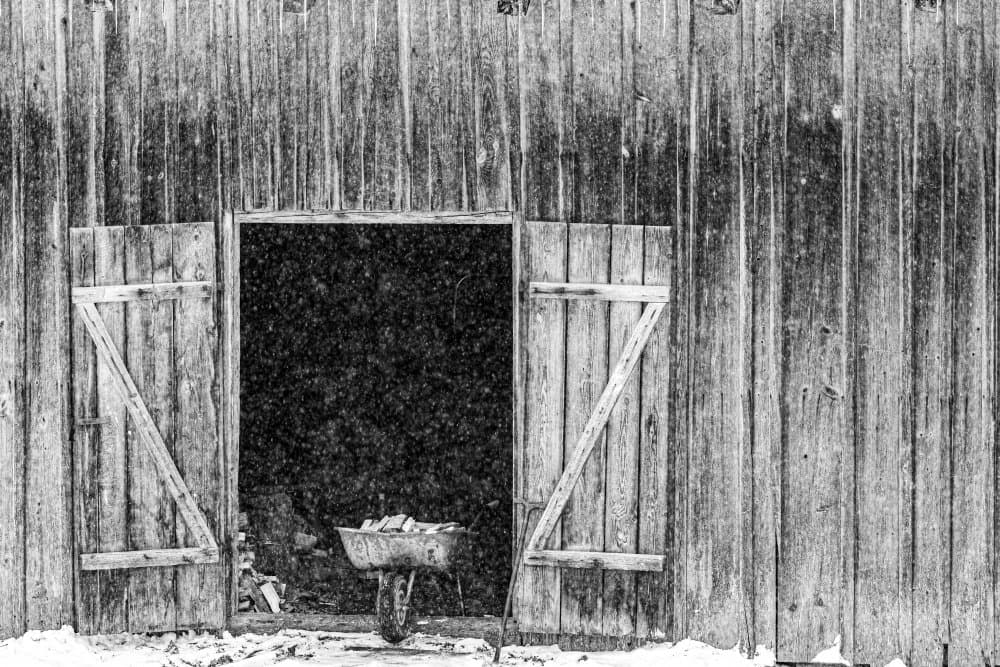 Snowy Barn Door by Dzintra Zvagina — canvas wall art