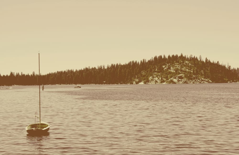 Serene Lake Sailboat by Gemma Bardot — canvas wall art
