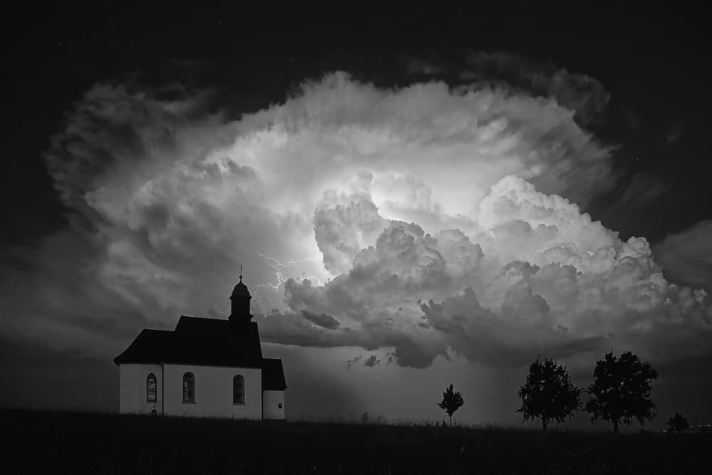 Thunderstorm Over Church by Judith Kuhn — canvas wall art