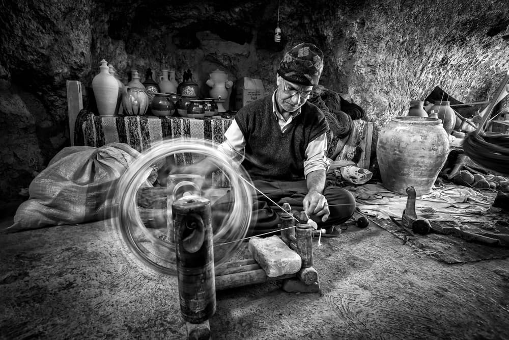 Artisan Spinning Yarn by Mohammadreza Momeni — canvas wall art