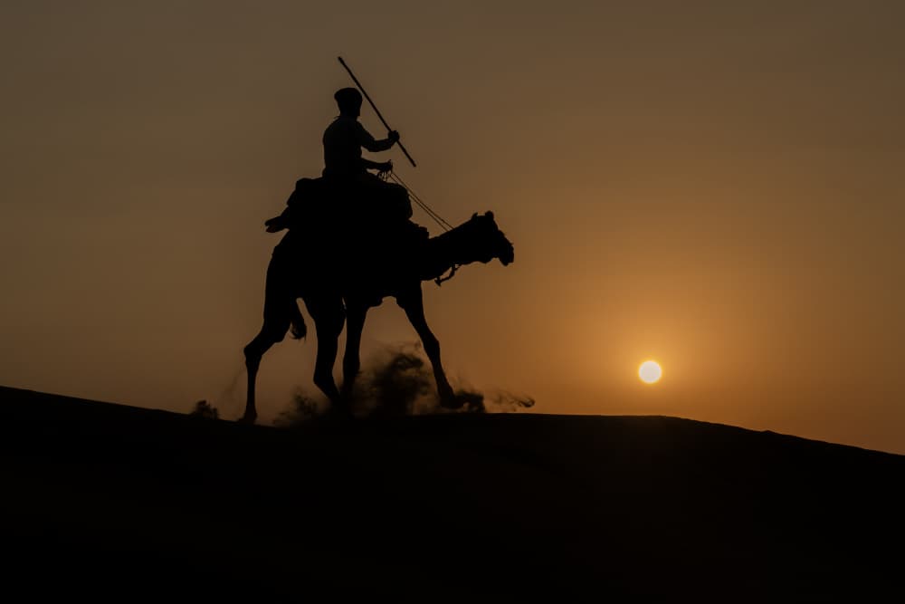 Desert Sunset Camel Rider by Mustafa Sahin — canvas wall art
