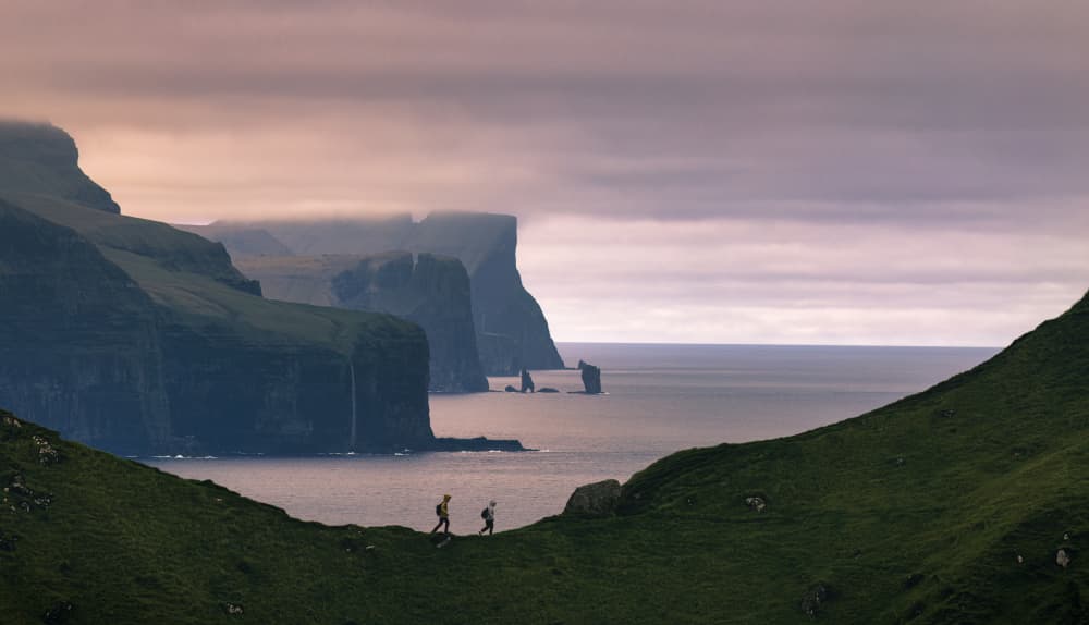 Hikers On Misty Cliffs by Jie Jin — canvas wall art