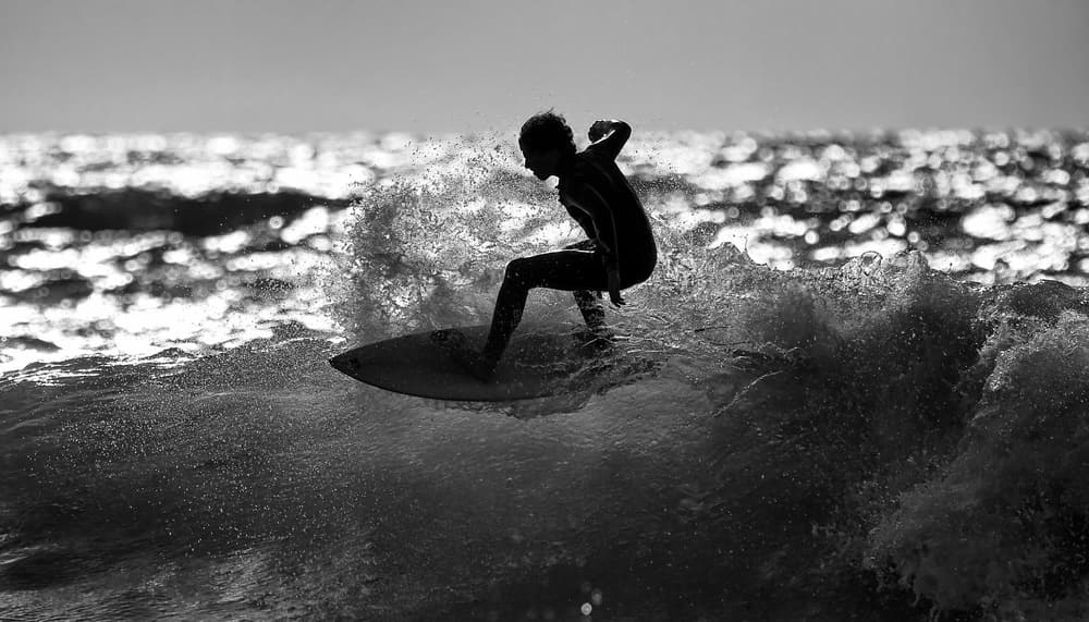 Dynamic Surfer Silhouette by Eyal Bussiba — canvas wall art