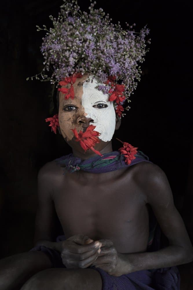 Floral Child Portrait by Sarawut Intarob — canvas wall art