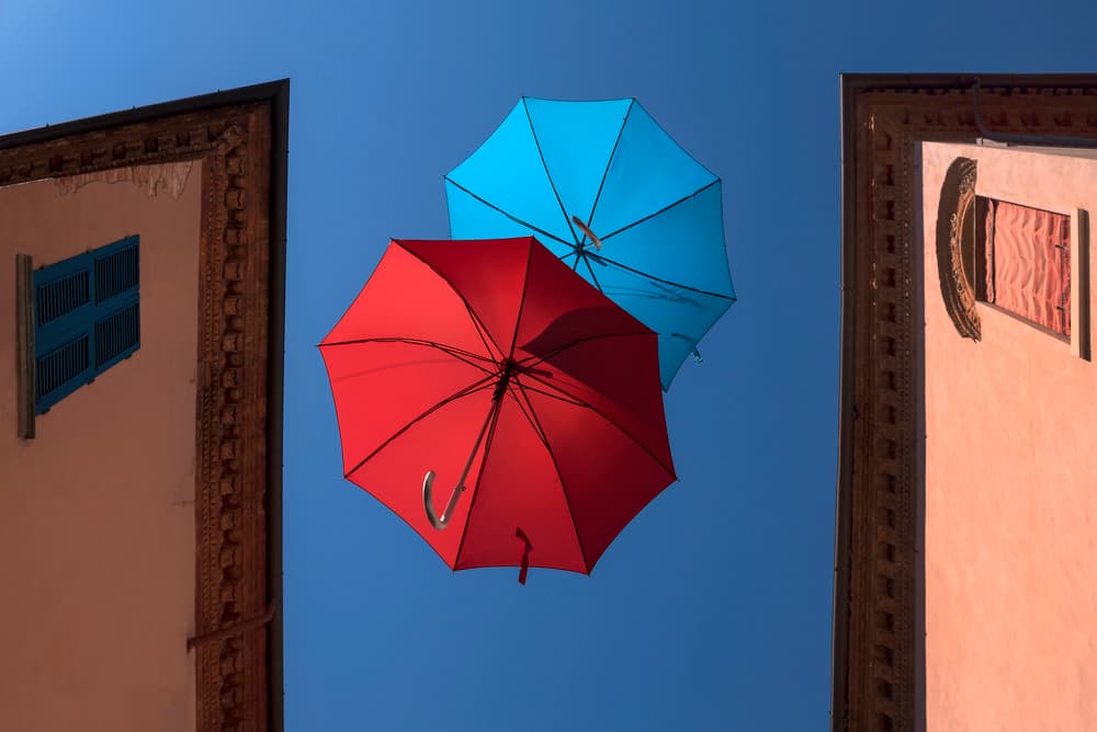 Colorful Umbrellas Sky by Jure Kravanja — canvas wall art