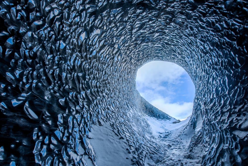 Frozen Glacier Tunnel by Faris Saieda — canvas wall art