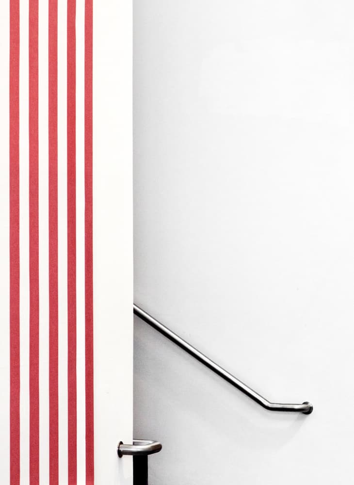 Red Stripes and Railing by Jeroen van de Wiel — canvas wall art