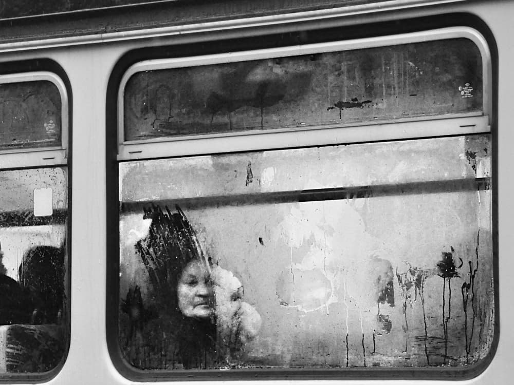 Woman Through Dirty Window by Nicoleta Gabor — canvas wall art
