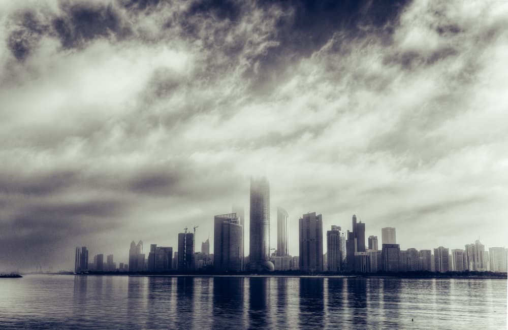 Moody Cityscape Reflection by Mohamed Kazzaz — canvas wall art