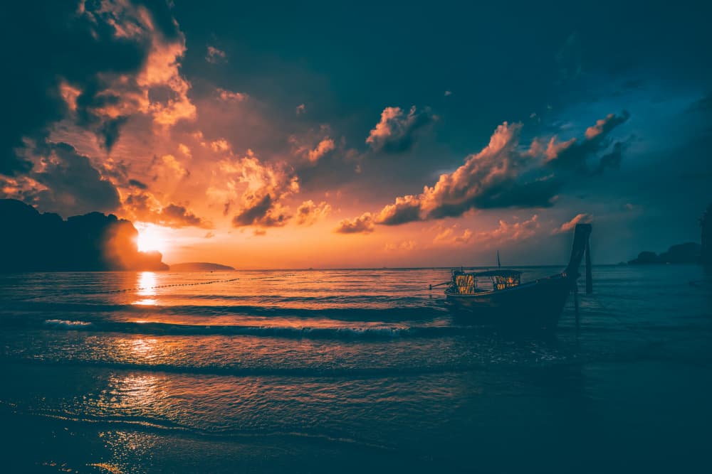 Tropical Sunset Boat by Eros Erika — canvas wall art