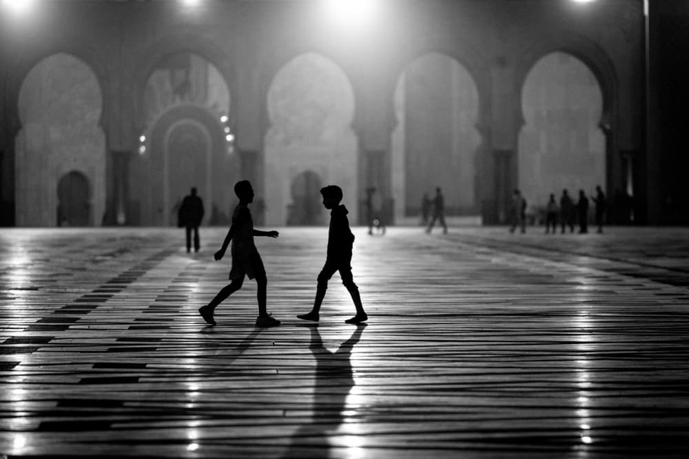 Boys in Grand Archway by Gina Buliga — canvas wall art