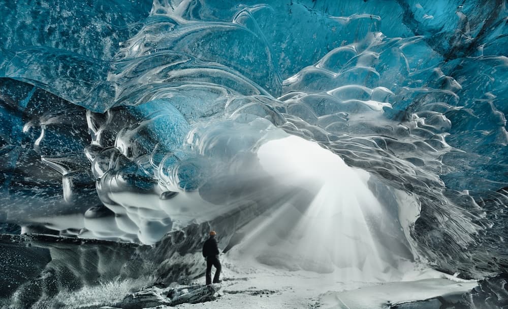 Blue Ice Cave Light Rays by Lior Yaakobi — canvas wall art