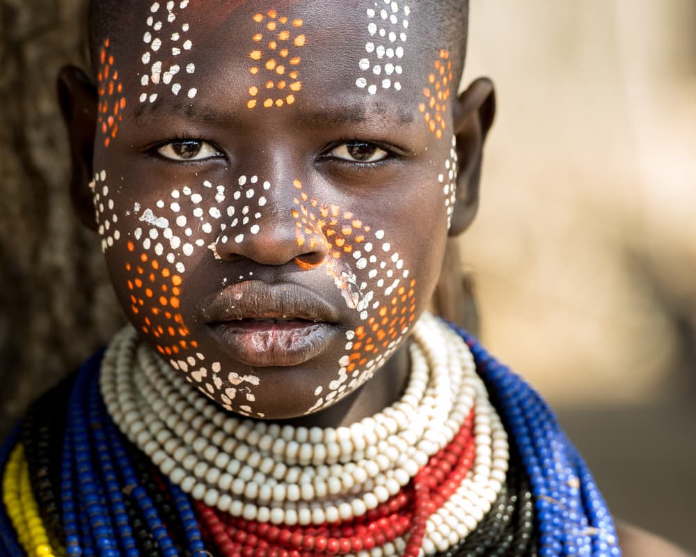 Vibrant Tribal Portrait by Tomasz Solinski — canvas wall art