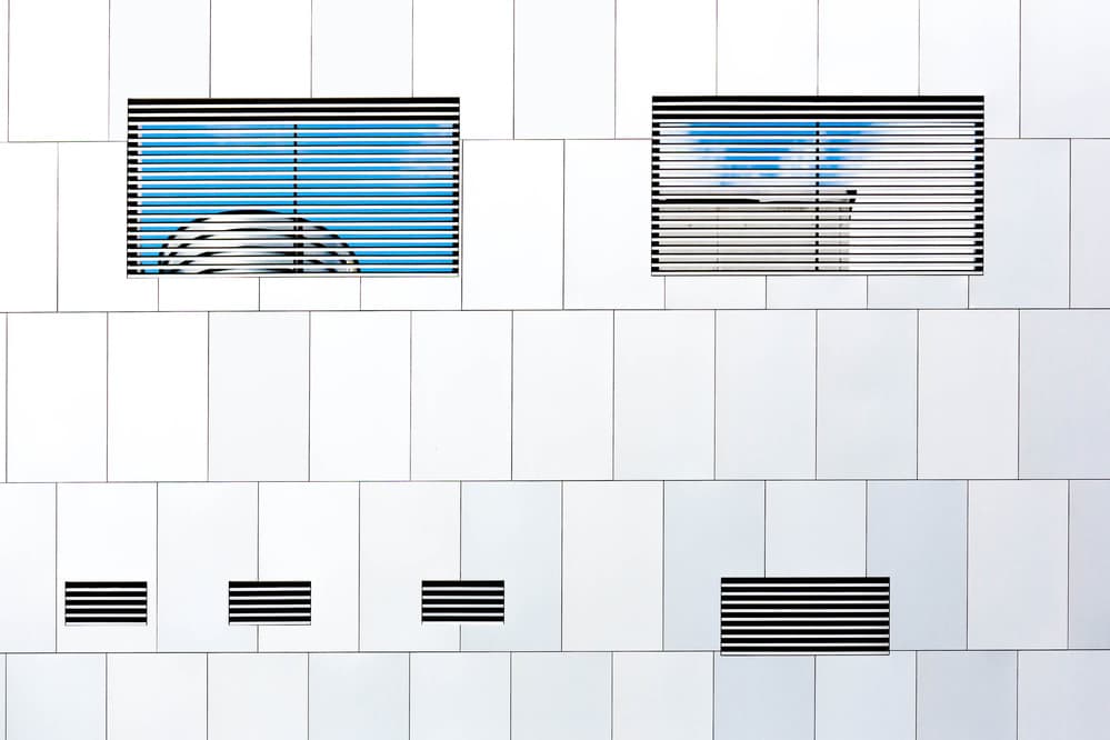 Modern Facade Blue Sky by Jan Niezen — canvas wall art