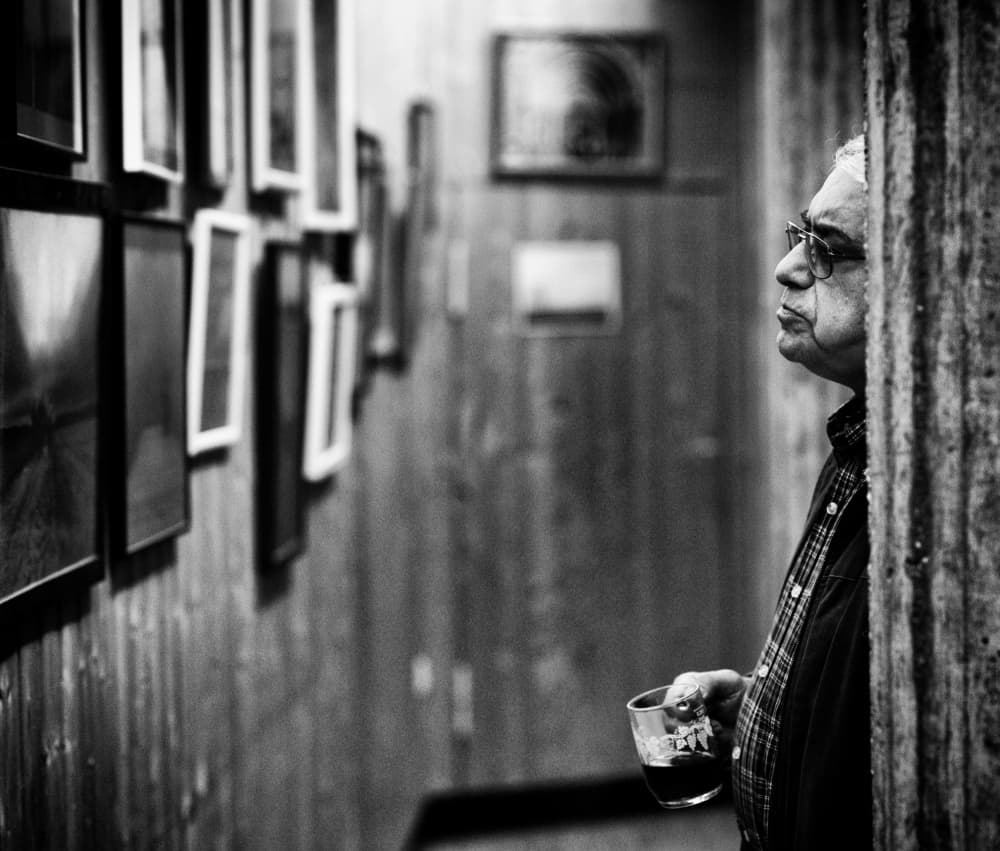 Man Contemplating Art by Jürgen Hartlieb — canvas wall art