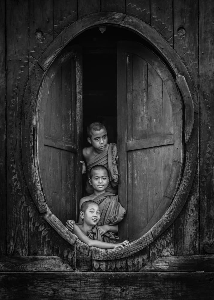Young Monks Window by ADIREK M — canvas wall art