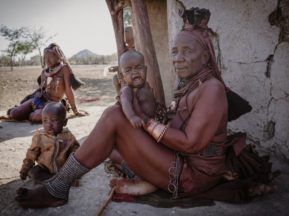 Himba Woman and Child by Eyal Alcalay — canvas wall art