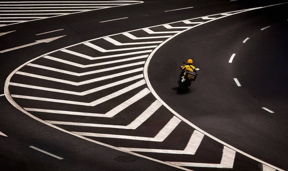 Urban Motorcycle Flow by Emma Zhao — canvas wall art