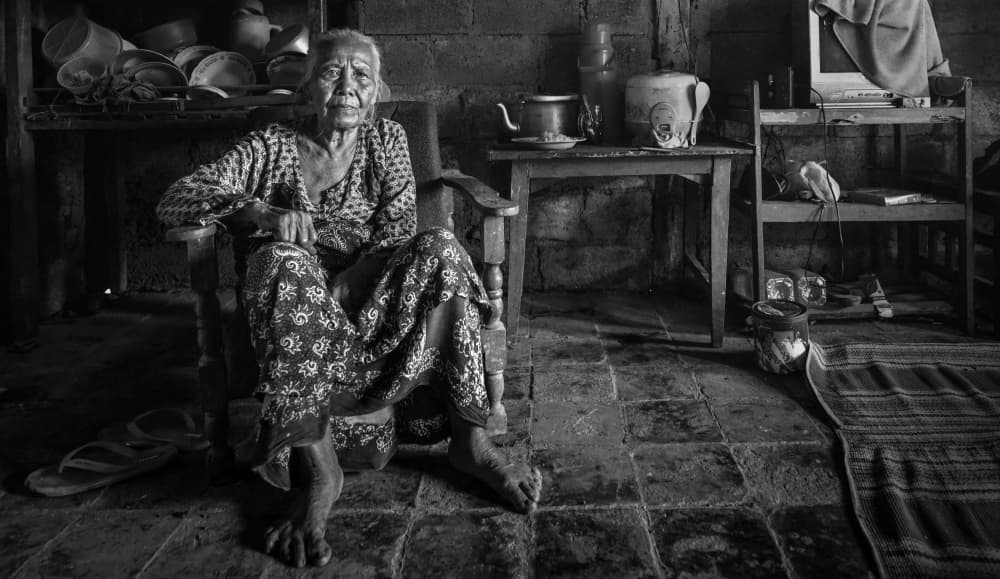 Elderly Woman at Home by Fahmi Bhs — canvas wall art
