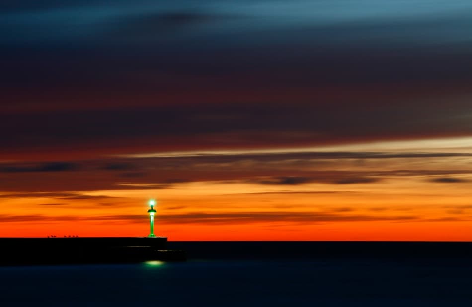 Lighthouse Sunset Glow by Niels Christian Wulff — canvas wall art