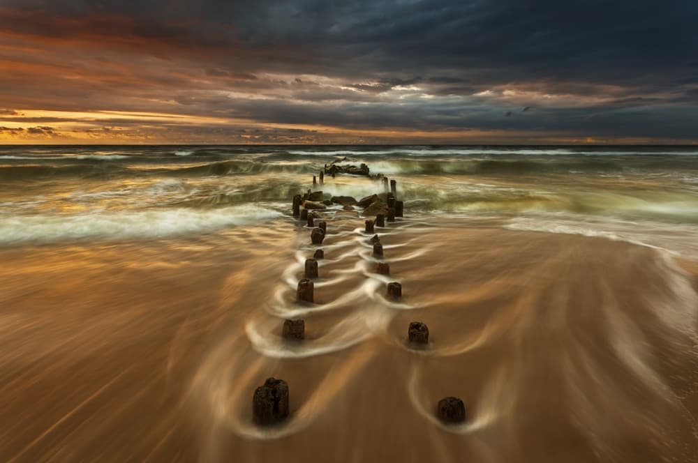 Dramatic Sunset Waves by Krzysztof Browko — canvas wall art
